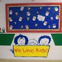This is our front entrance.  There is a new bulletin board created by our classes each month!