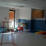 This is our indoor play room!  It’s a great space to run around and practice our gross motor skills.  We make use of this room on rainy days, when the heat index gets over 100 degrees, during ozone alerts, and all winter long.